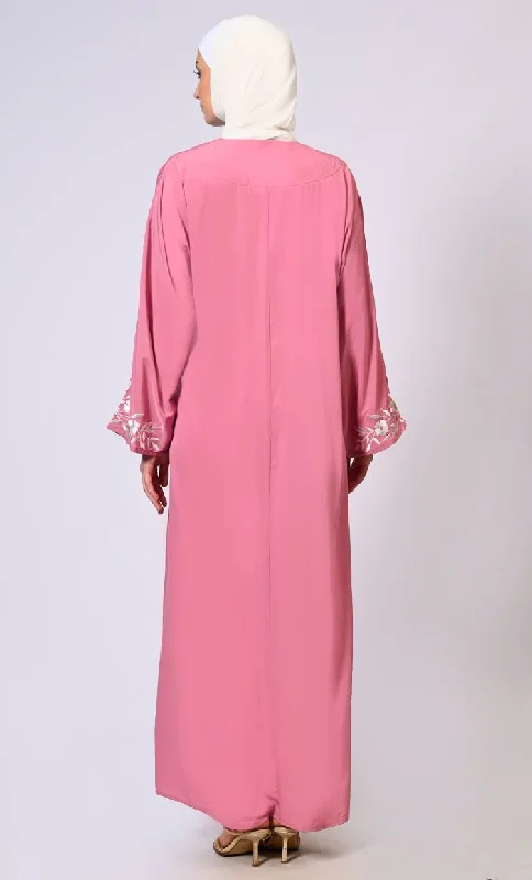 Embroidered Enchantment: Graceful Pink Abaya with Delicate Details and Belt