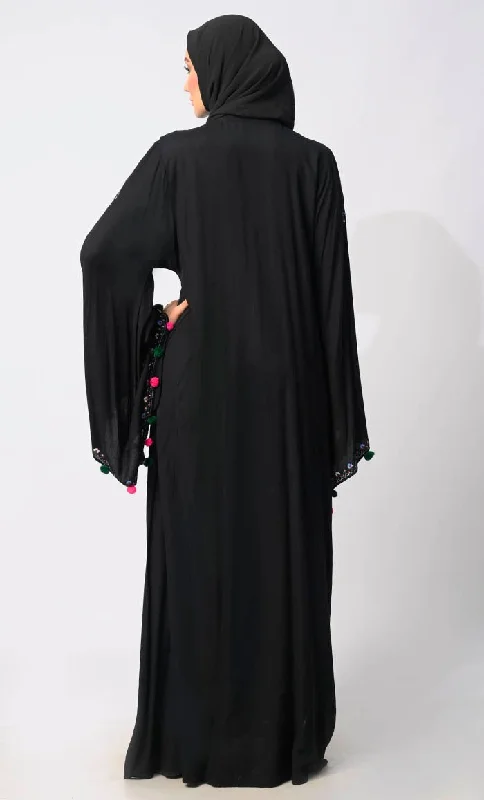 Enchanting Threads: Exquisite Black Embroidered Abaya with and Dramatic Bell Sleeves