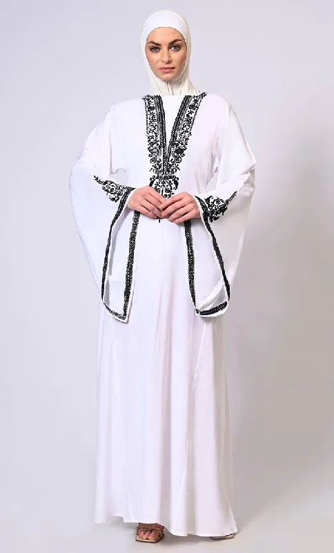 White Abaya with Bell Sleeves adorned in Hand & Machine Embroidery