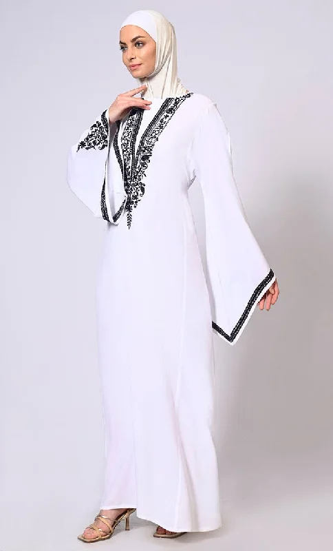 White Abaya with Bell Sleeves adorned in Hand & Machine Embroidery