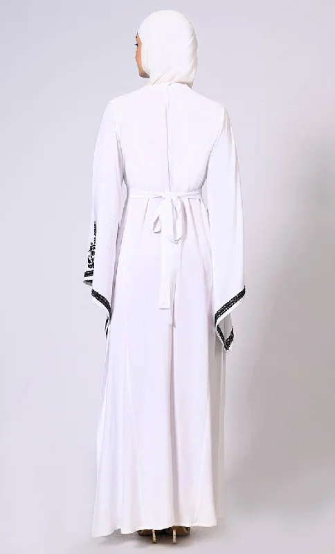 White Abaya with Bell Sleeves adorned in Hand & Machine Embroidery