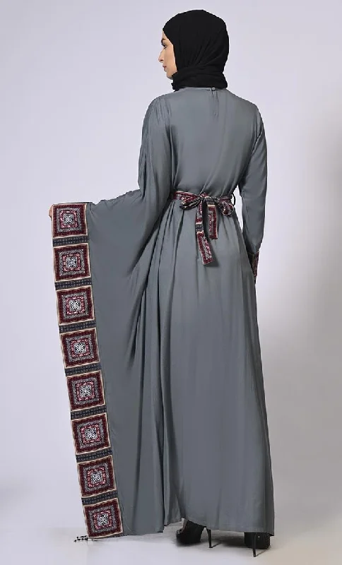 Stylish Semi Grey Kaftan with Printed Panels and Tassel Details